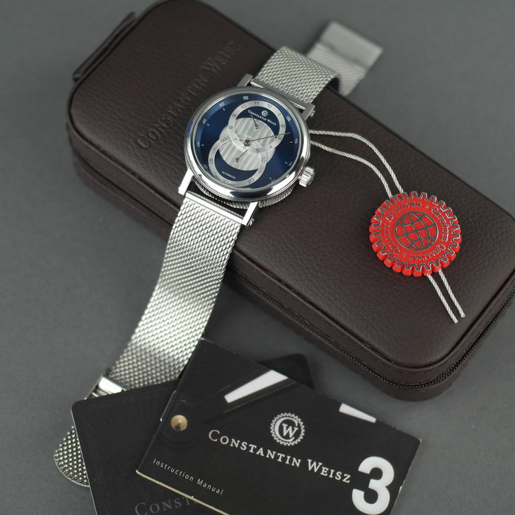 Constantin Weisz Herren-Automatikarmbanduhr mit 20 Steinen und Milanaise-Armband