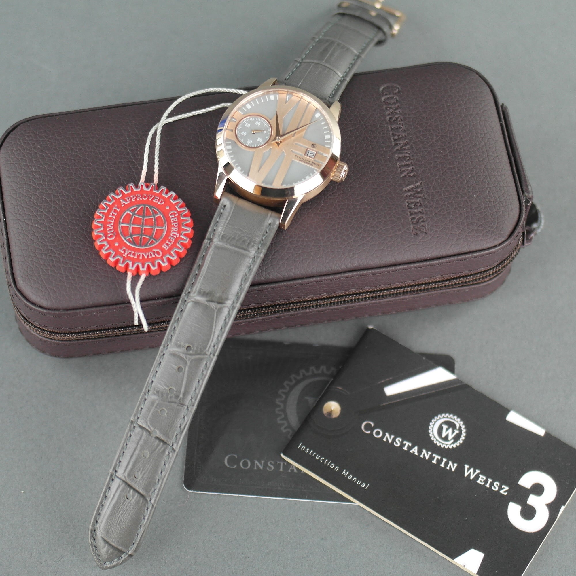 Constantin Weisz Reloj de pulsera automático chapado en oro de 30 joyas con correa gris