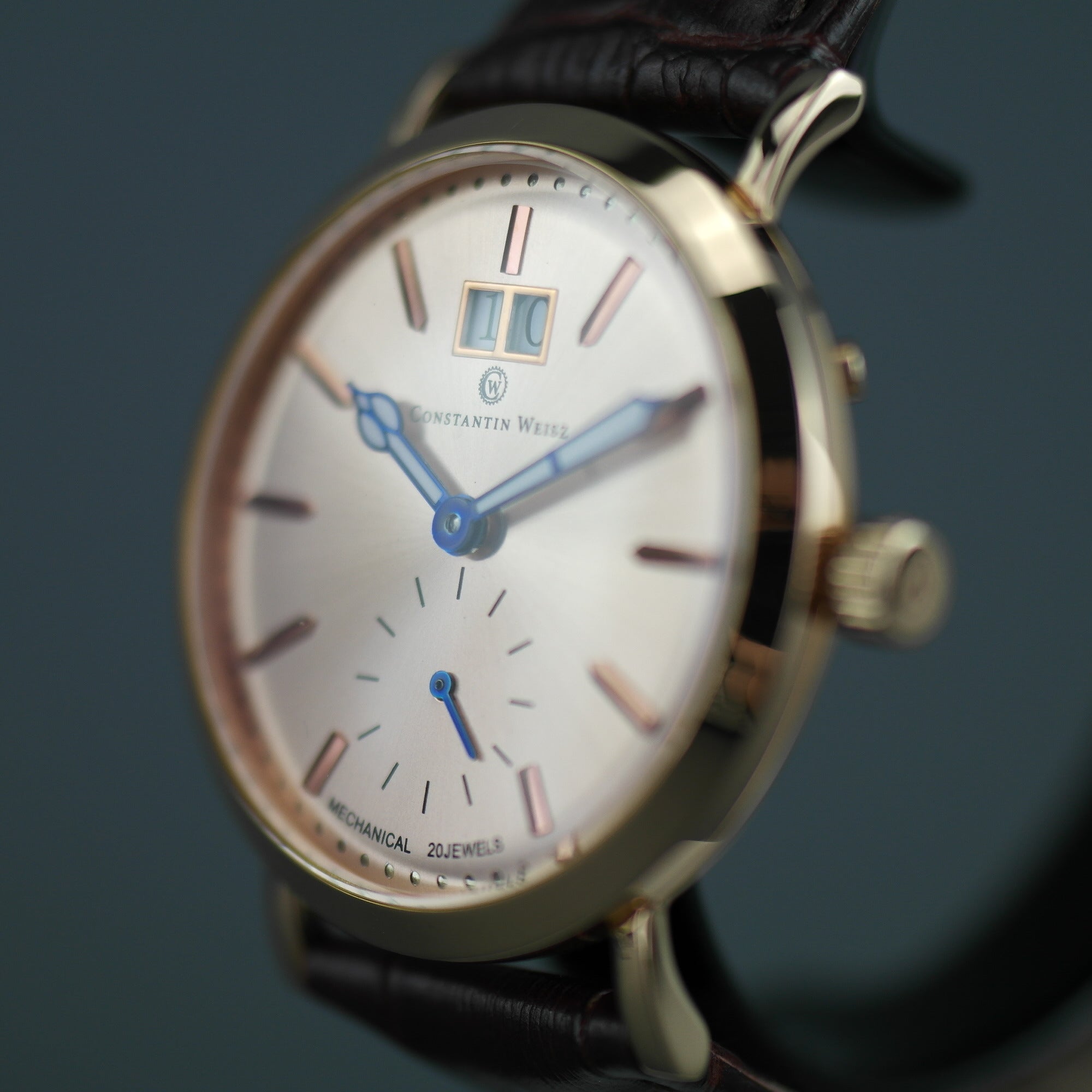 Constantin Weisz Gold plated mechanical wrist watch with brown leather strap