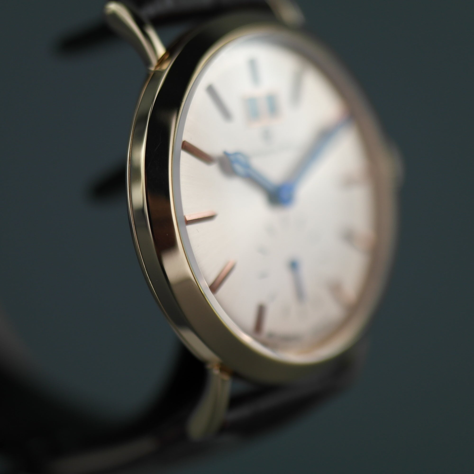 Constantin Weisz Gold plated mechanical wrist watch with brown leather strap