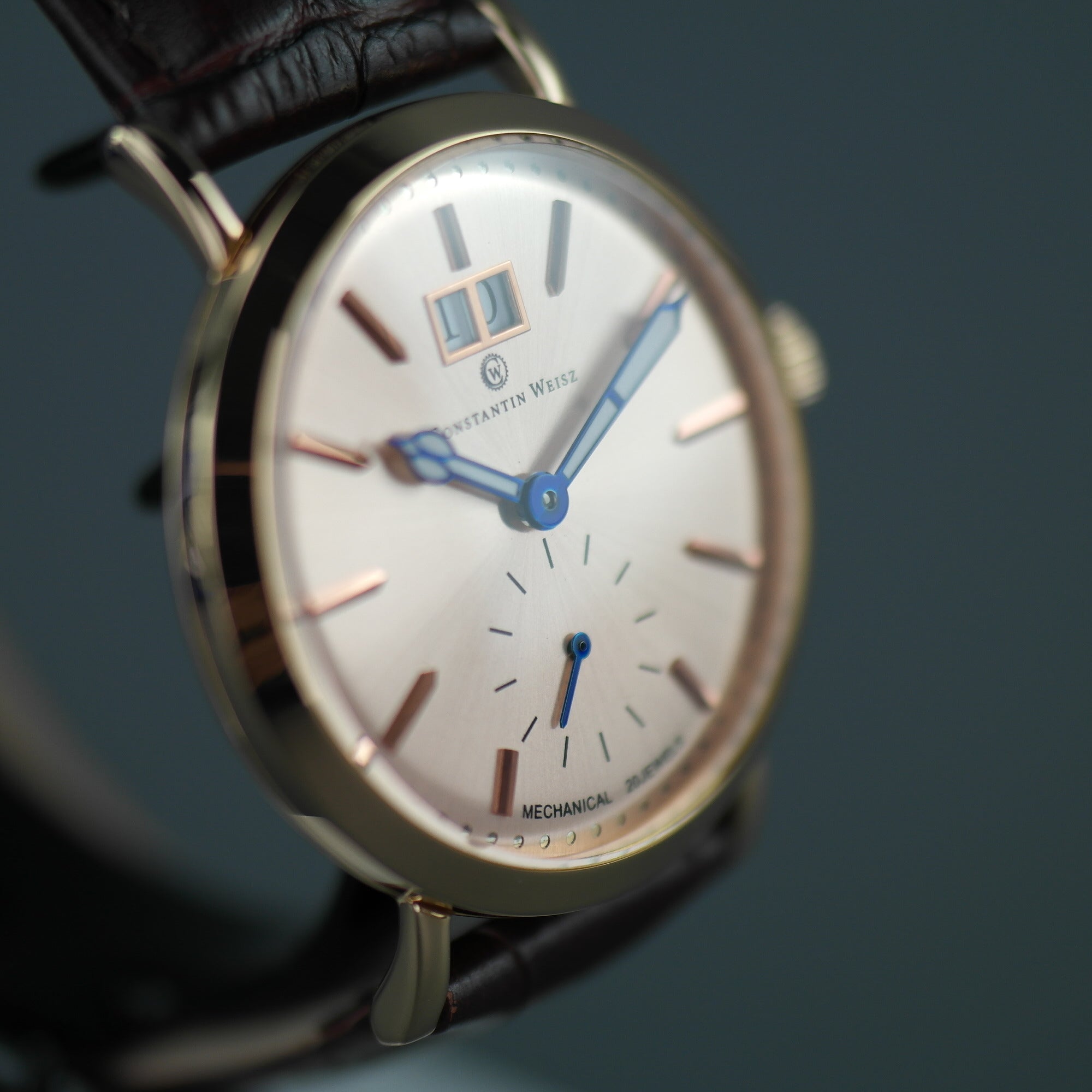 Constantin Weisz Gold plated mechanical wrist watch with brown leather strap