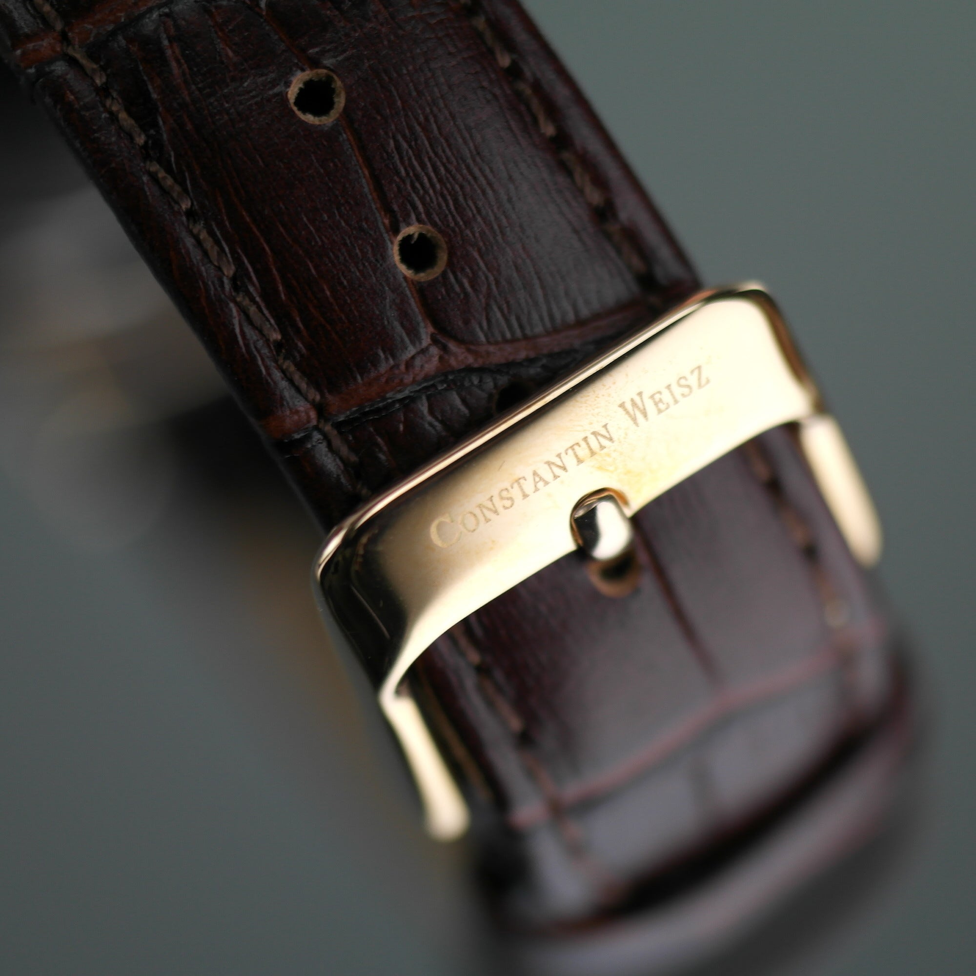 Constantin Weisz Gold plated mechanical wrist watch with brown leather strap