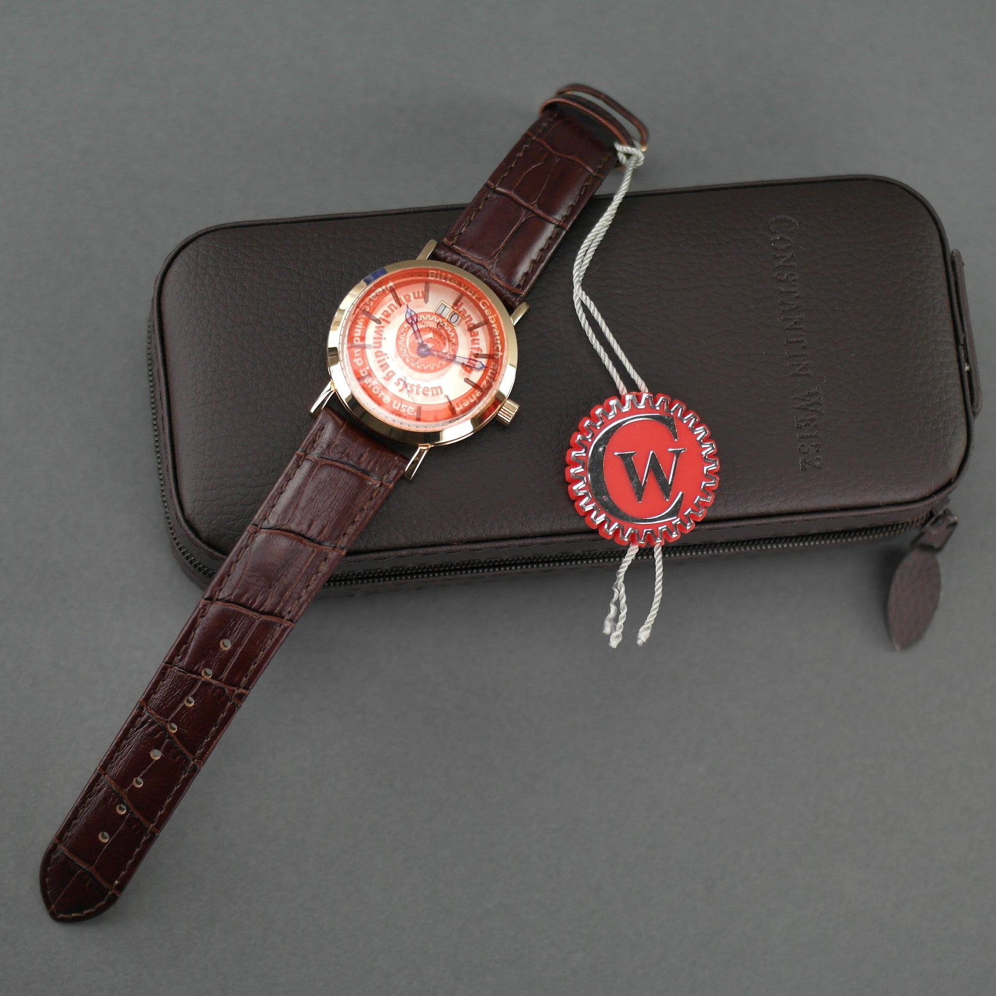 Constantin Weisz Gold plated mechanical wrist watch with brown leather strap