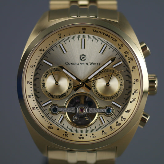 Constantin Weisz Vergoldete automatische Tachymeter-Armbanduhr mit offenem Herzen und Armband