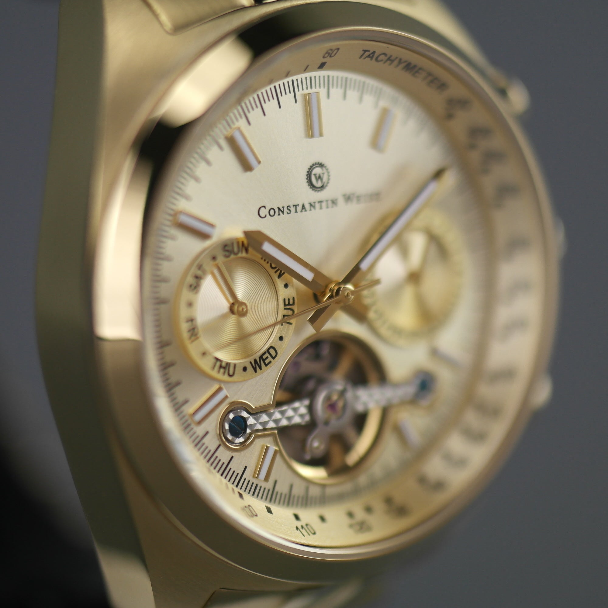 Constantin Weisz Vergoldete automatische Tachymeter-Armbanduhr mit offenem Herzen und Armband