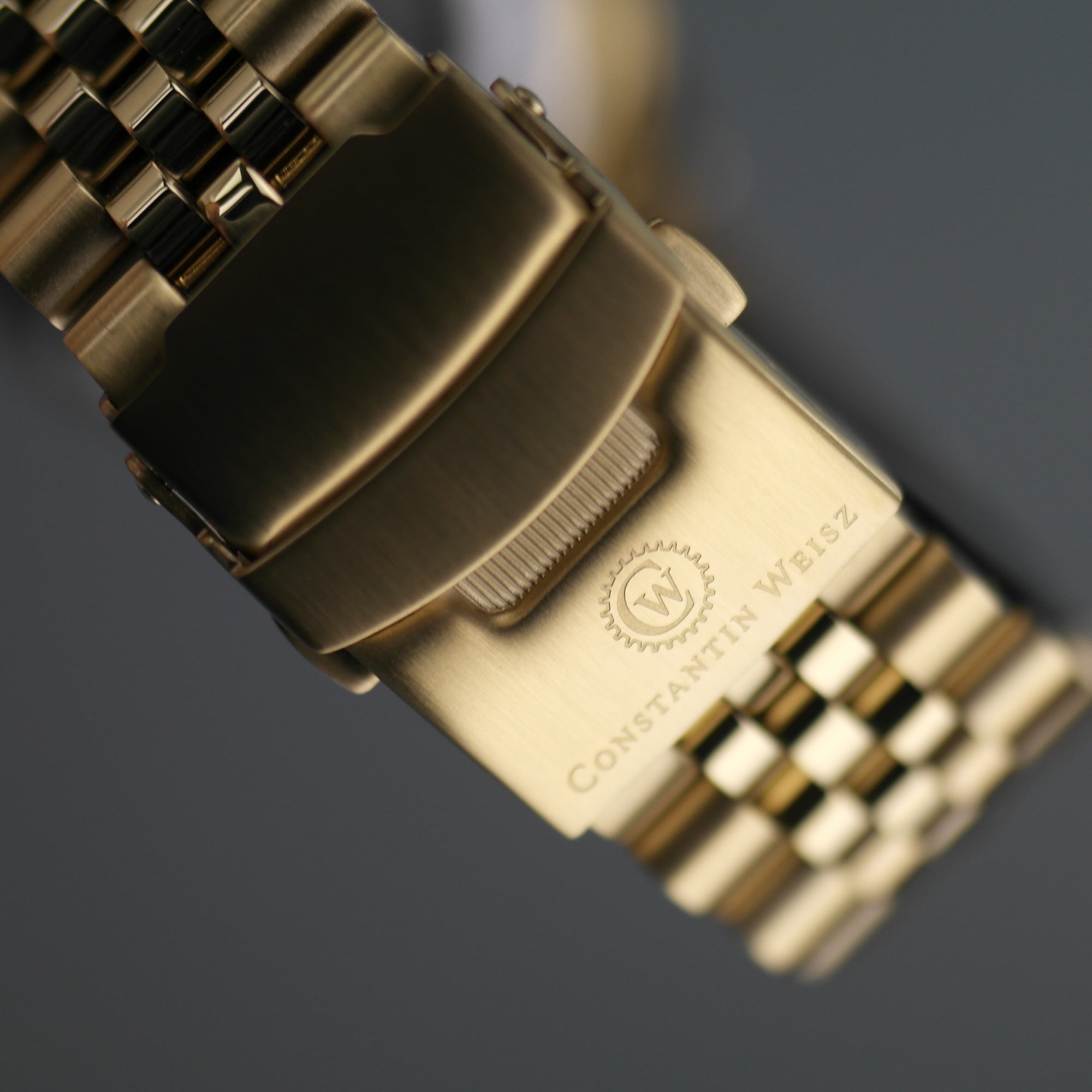 Constantin Weisz Vergoldete automatische Tachymeter-Armbanduhr mit offenem Herzen und Armband