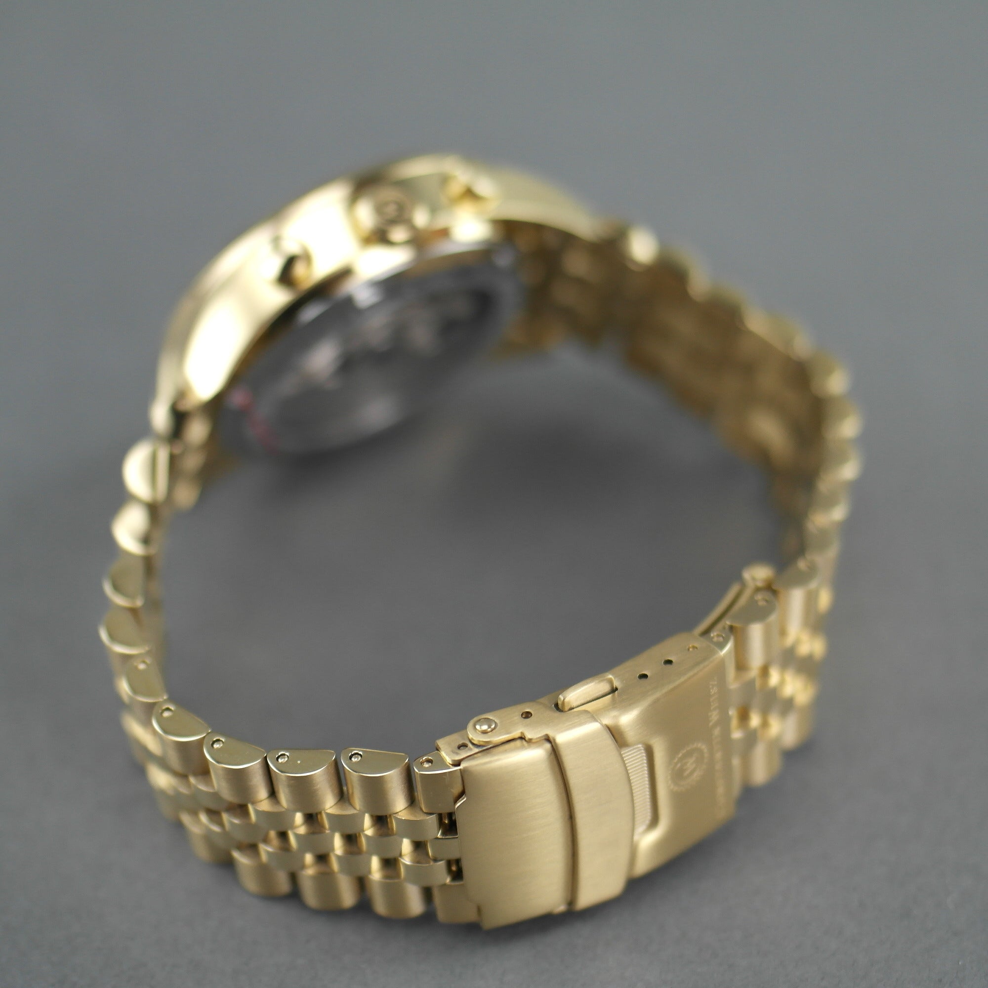 Constantin Weisz Vergoldete automatische Tachymeter-Armbanduhr mit offenem Herzen und Armband