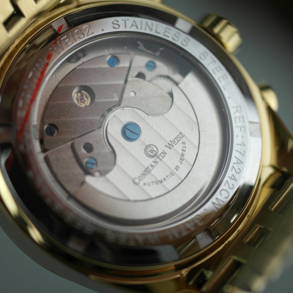 Constantin Weisz Gold plated Automatic Tachymeter Open heart wrist watch with bracelet