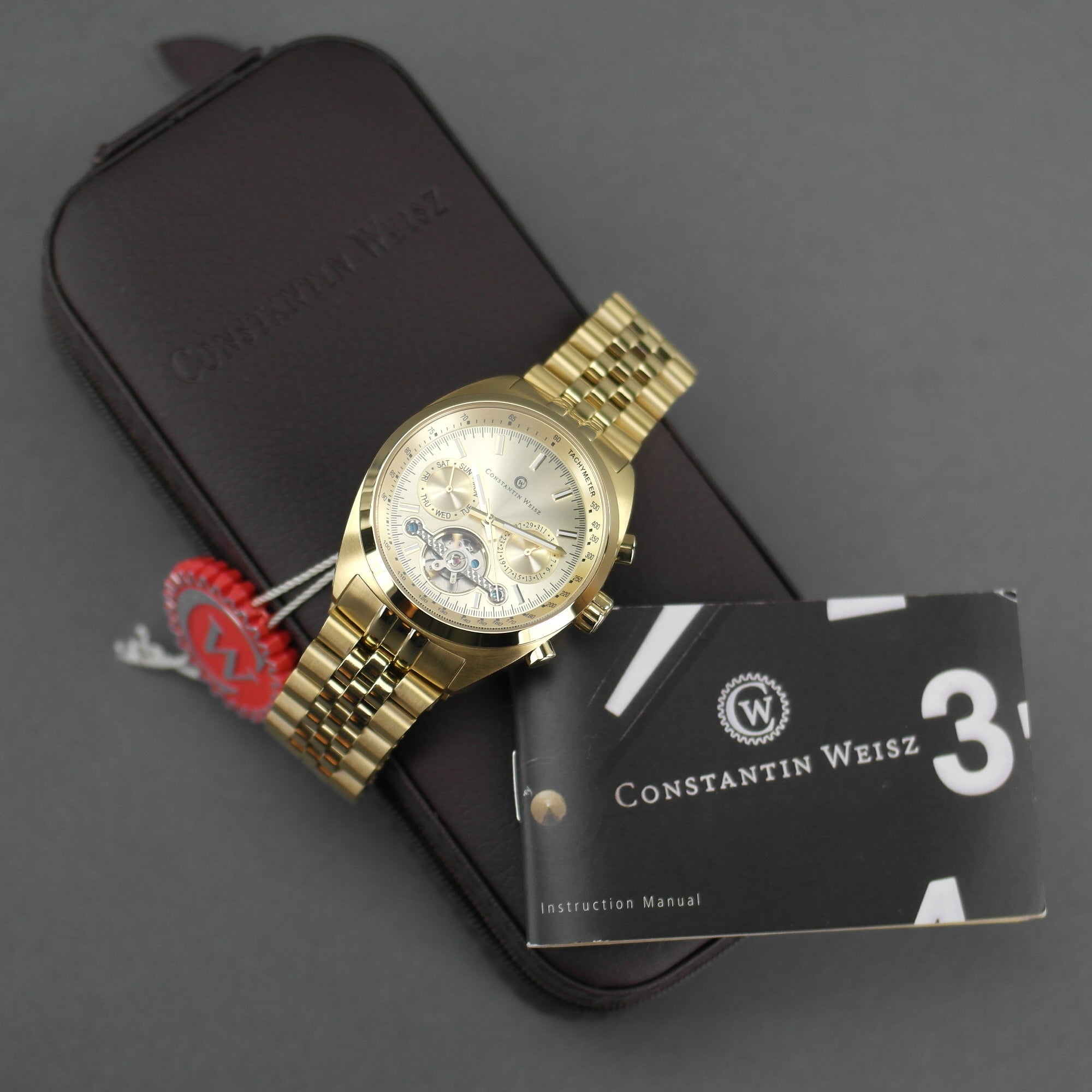 Constantin Weisz Vergoldete automatische Tachymeter-Armbanduhr mit offenem Herzen und Armband