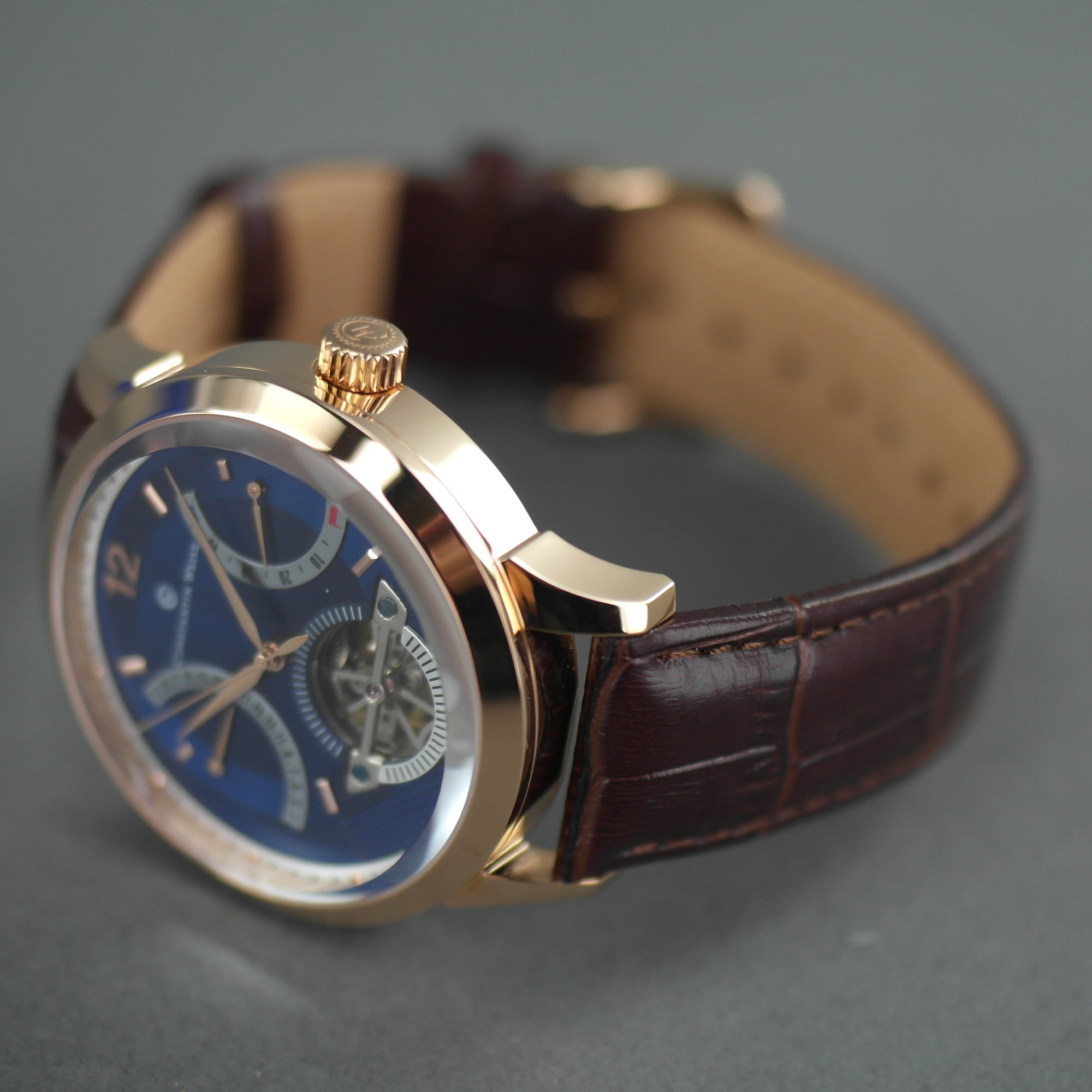 Constantin Weisz Vergoldete Automatik-Armbanduhr mit 38 Steinen und offenem Herzwerk, Lederarmband