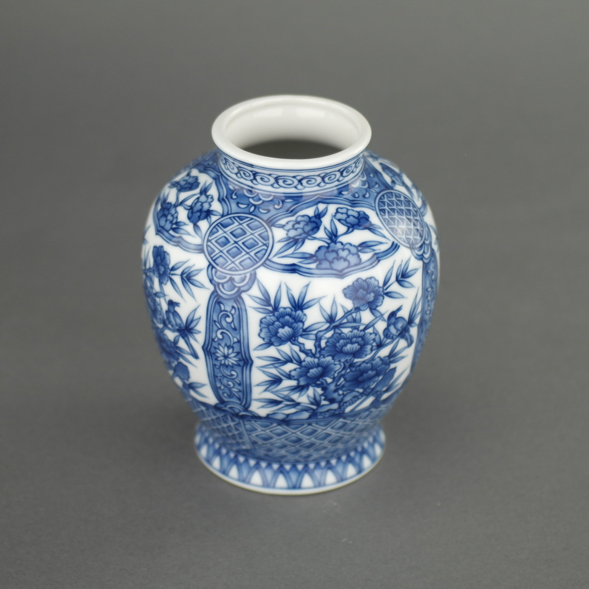 Oriental blue flowers vase "Dragon Peak" by the Sanyo Porcelain Company