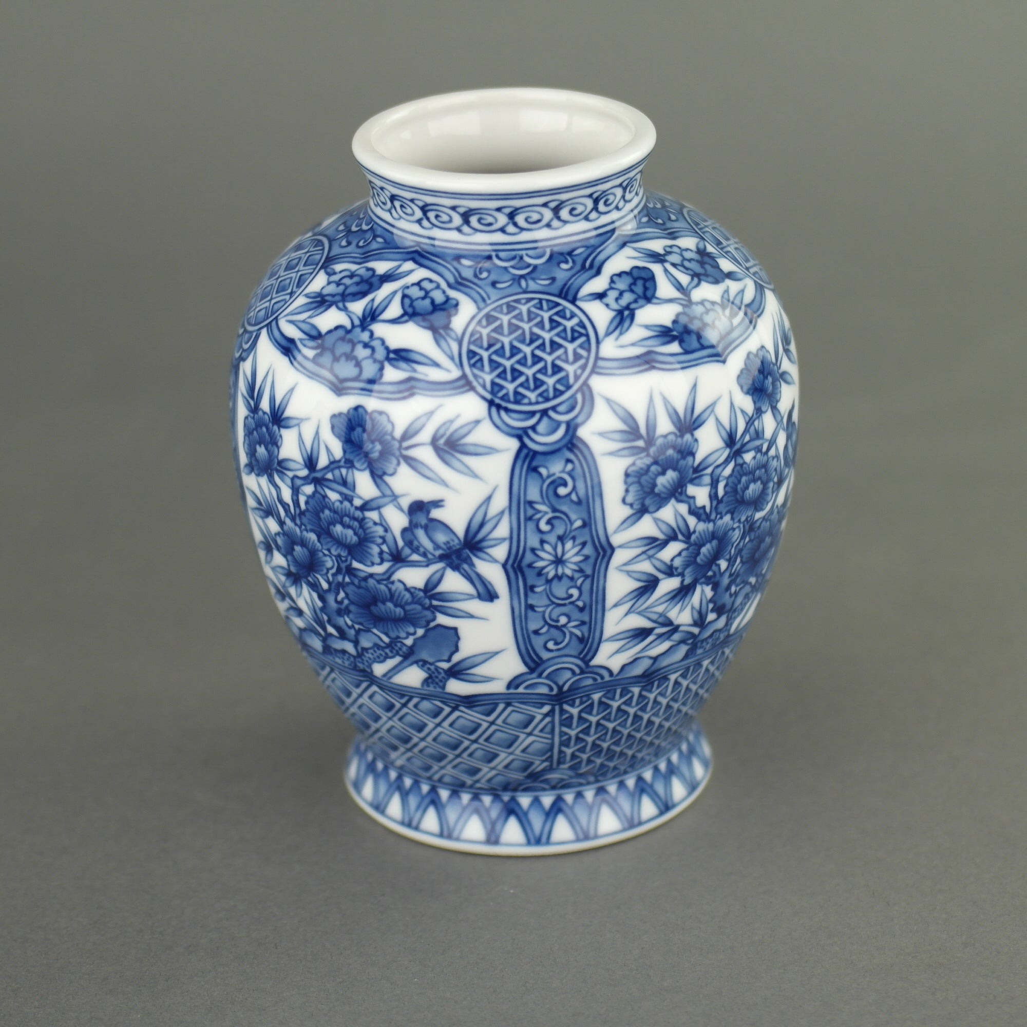 Oriental blue flowers vase "Dragon Peak" by the Sanyo Porcelain Company