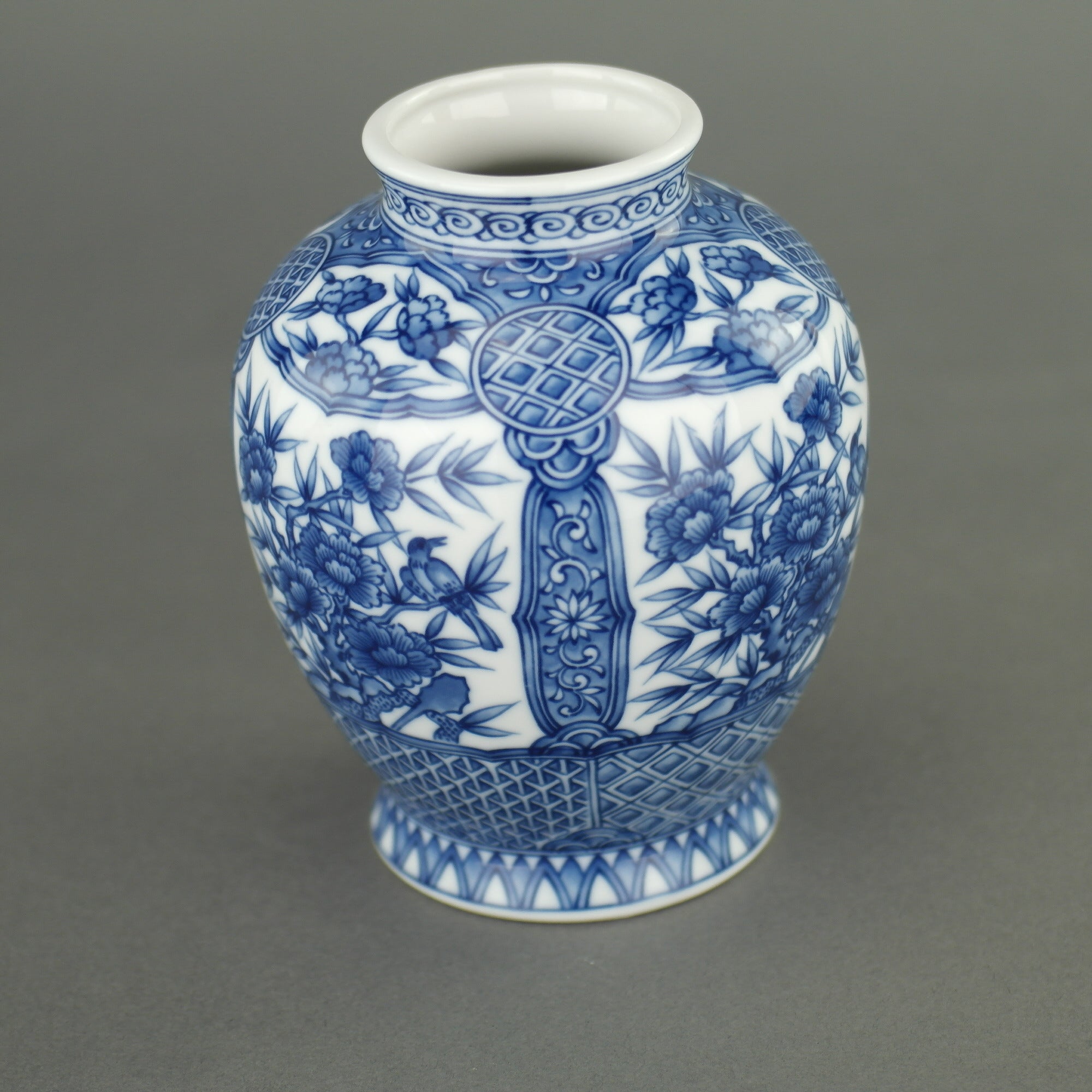 Oriental blue flowers vase "Dragon Peak" by the Sanyo Porcelain Company
