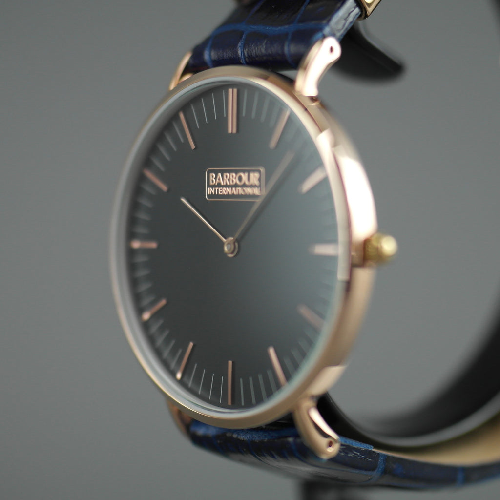 Barbour Hartley Reloj de pulsera chapado en oro con esfera negra y correa de cuero azul