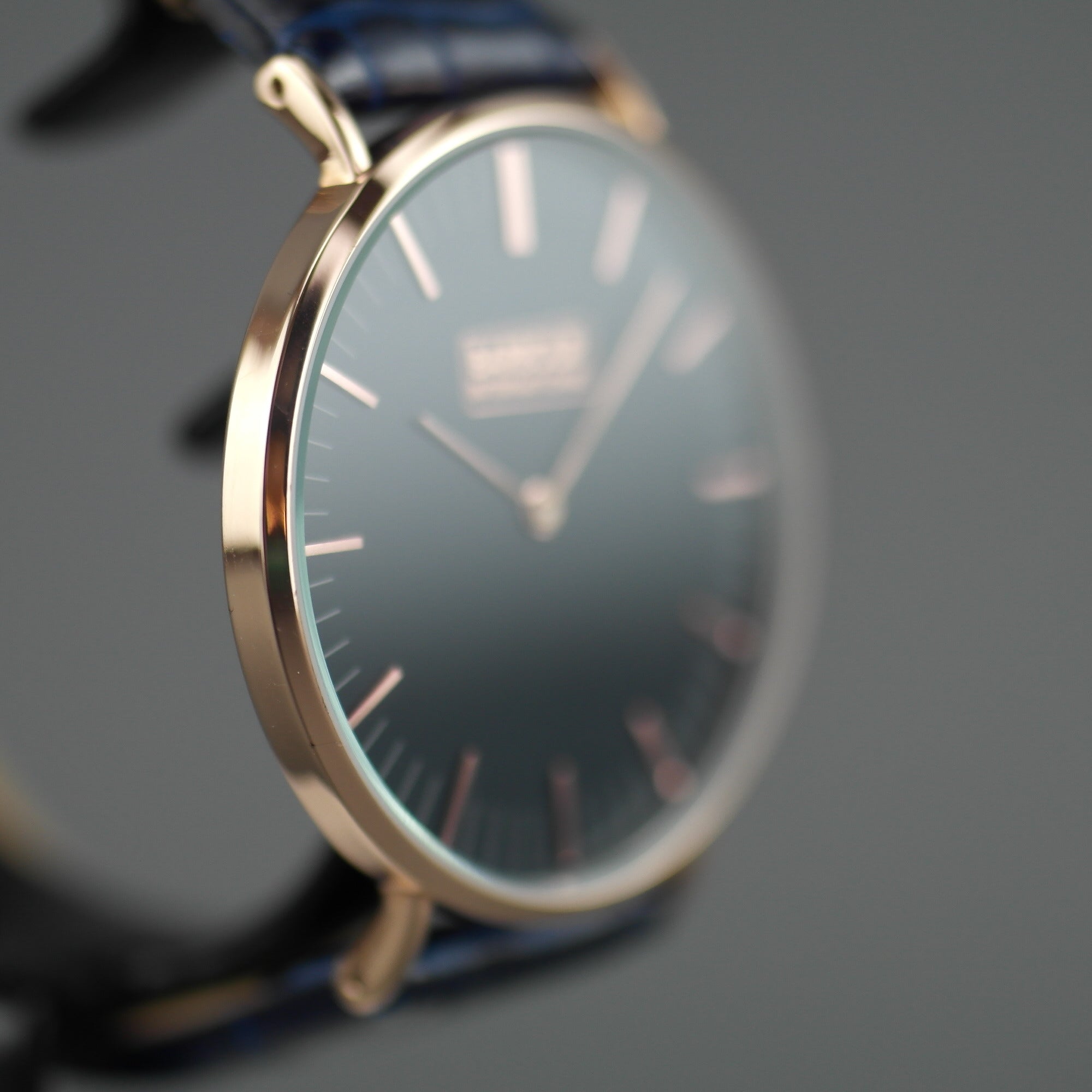 Barbour Hartley Gold plated wrist watch with black dial and blue leather strap