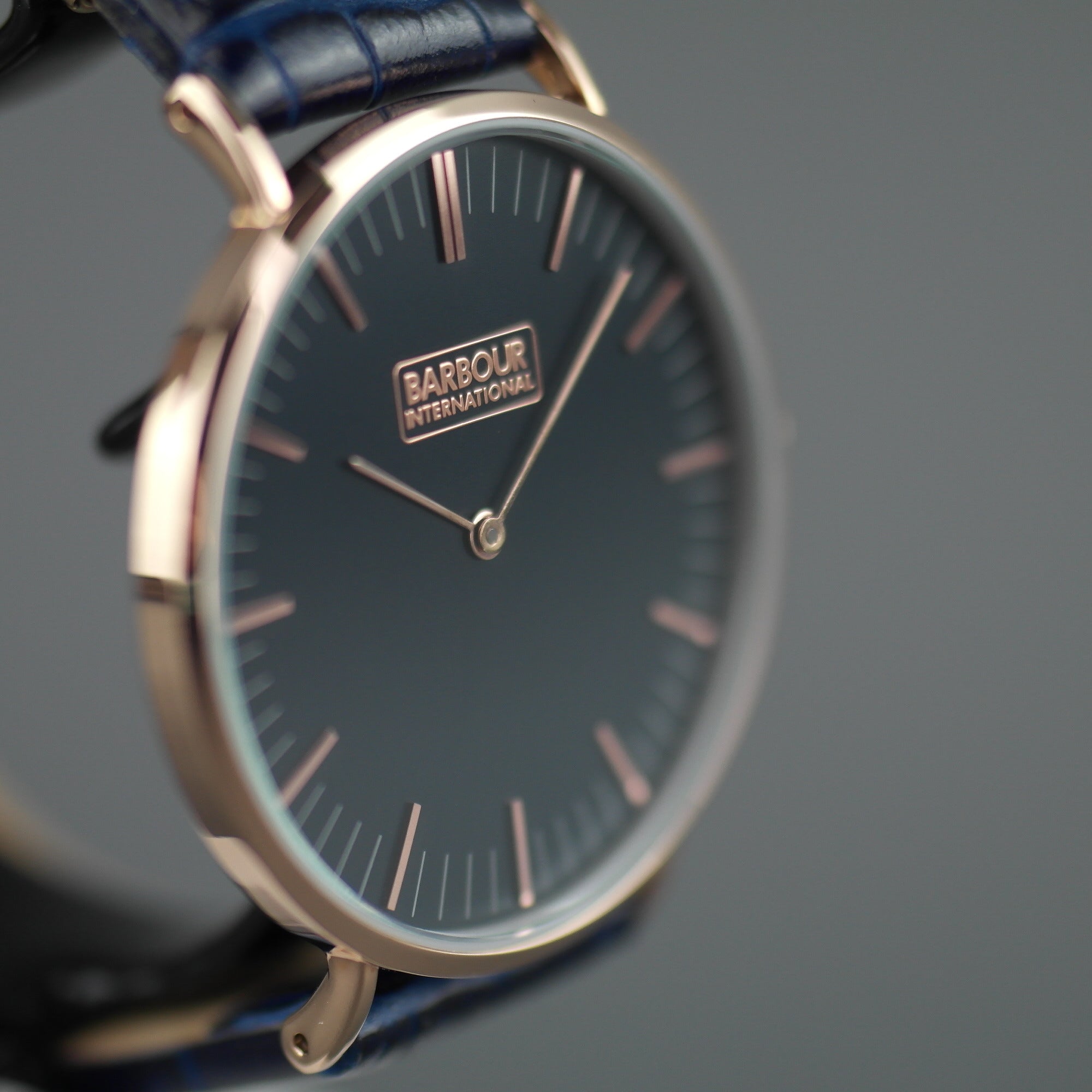 Barbour Hartley Gold plated wrist watch with black dial and blue leather strap