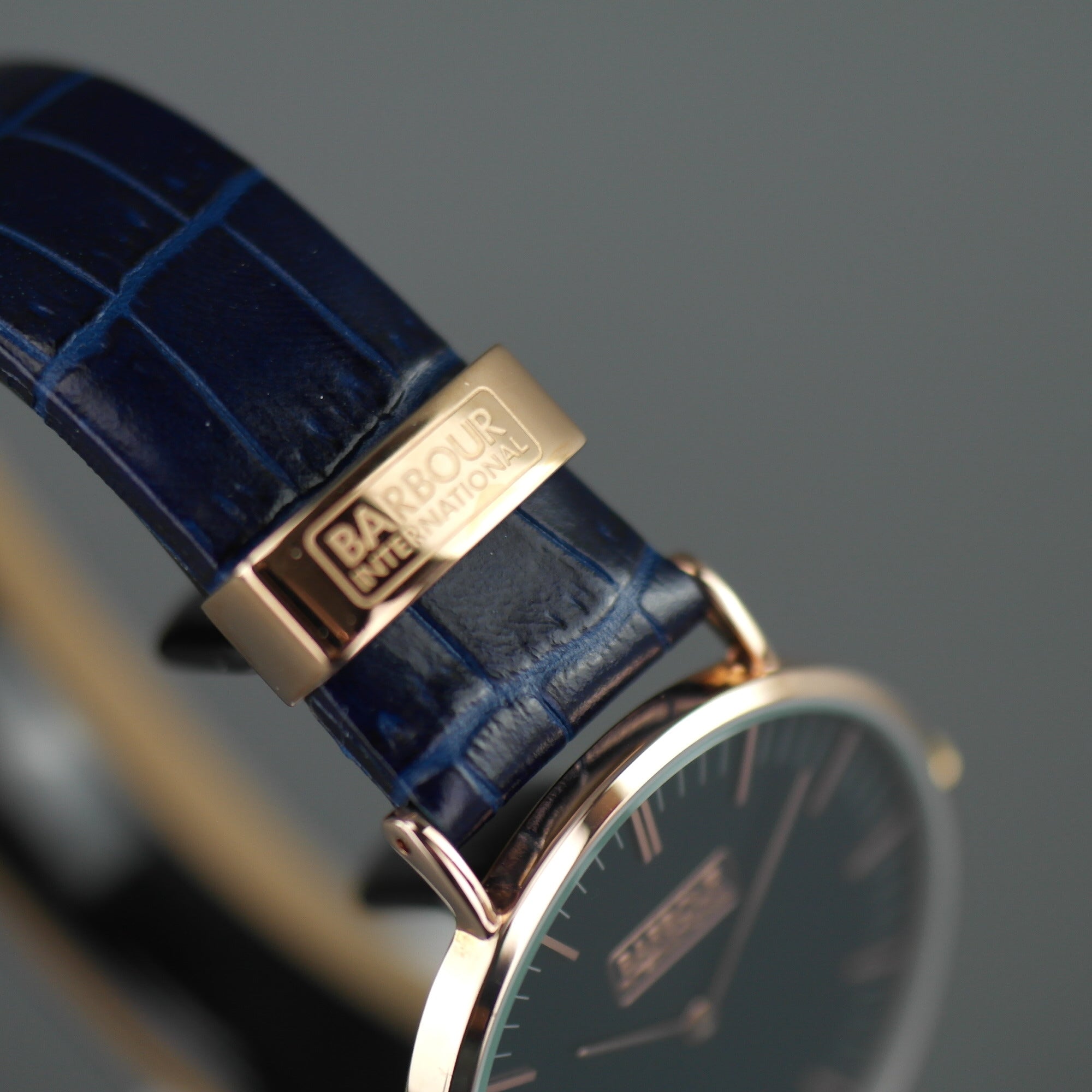 Barbour Hartley Gold plated wrist watch with black dial and blue leather strap