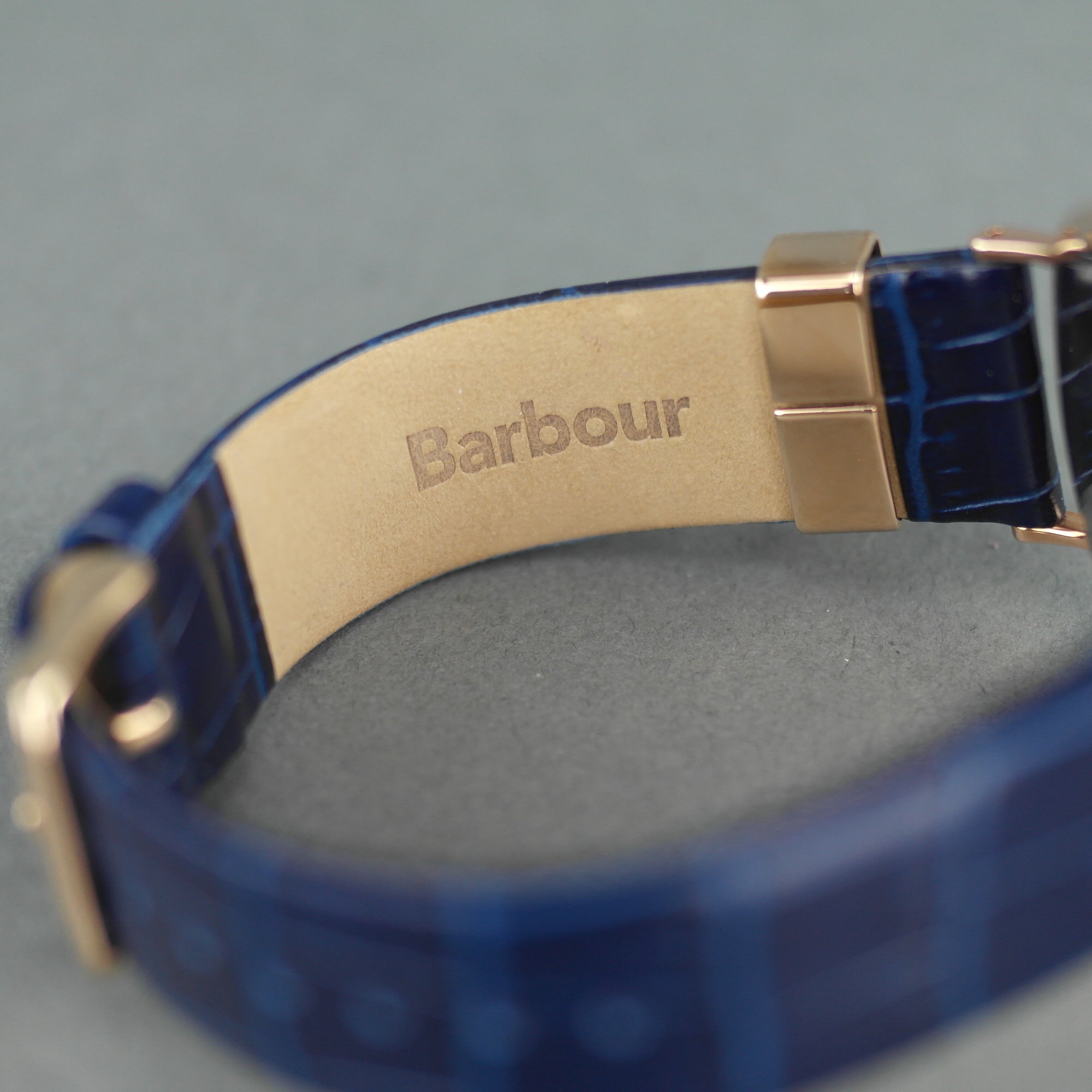 Barbour Hartley Gold plated wrist watch with black dial and blue leather strap