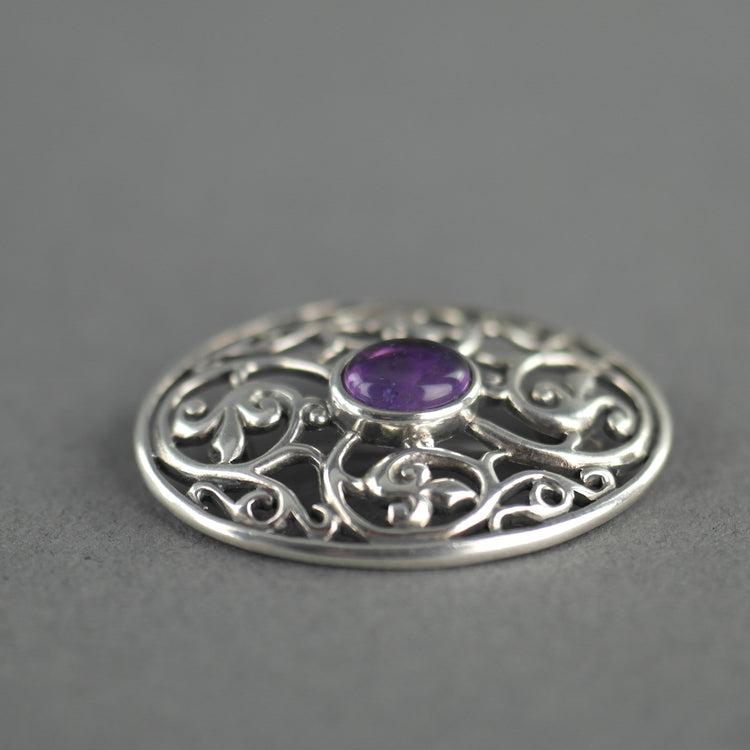 Vintage sterling silver pin brooch with amethyst cabochon