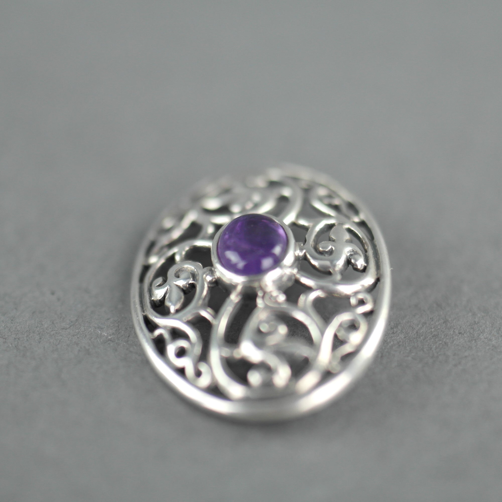 Vintage sterling silver pin brooch with amethyst cabochon