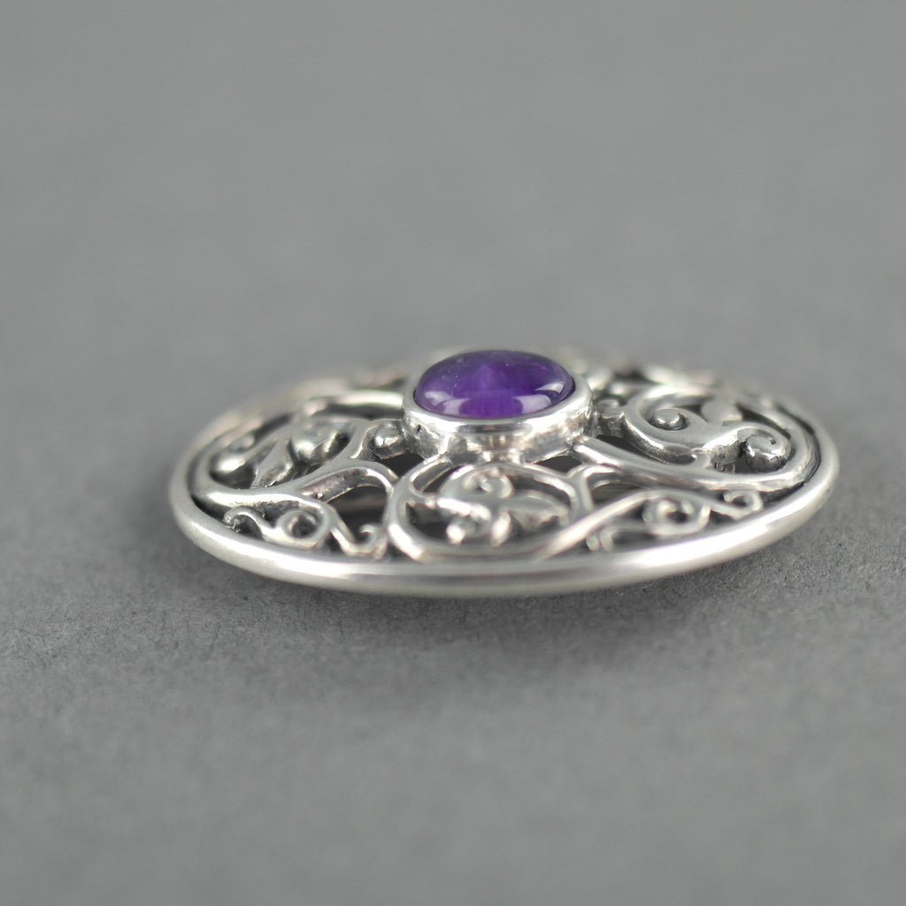 Vintage sterling silver pin brooch with amethyst cabochon