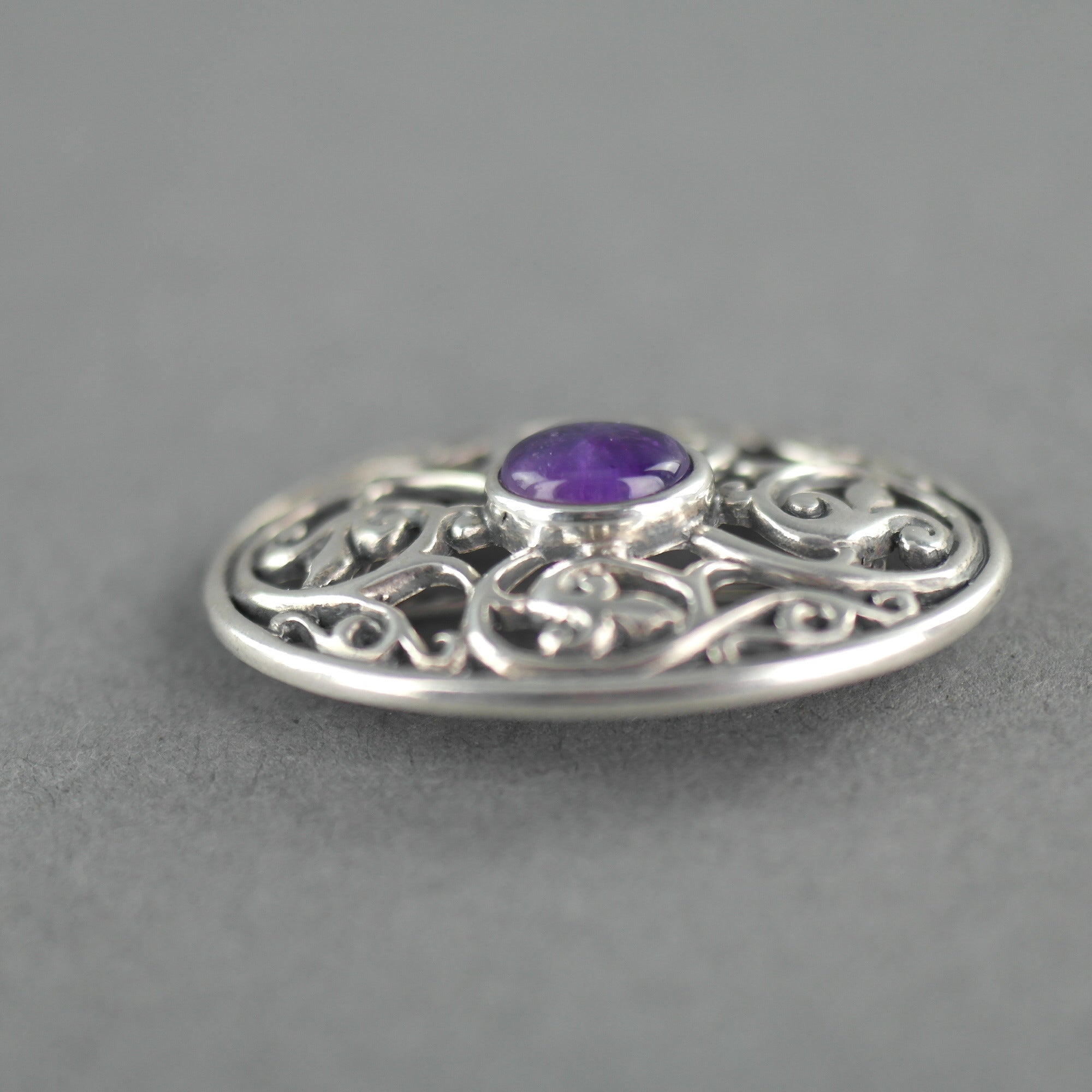 Vintage sterling silver pin brooch with amethyst cabochon