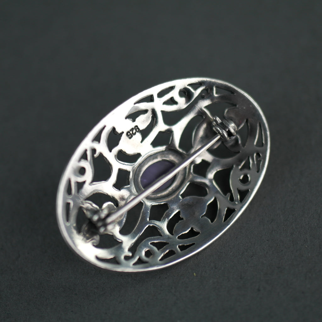 Vintage sterling silver pin brooch with amethyst cabochon