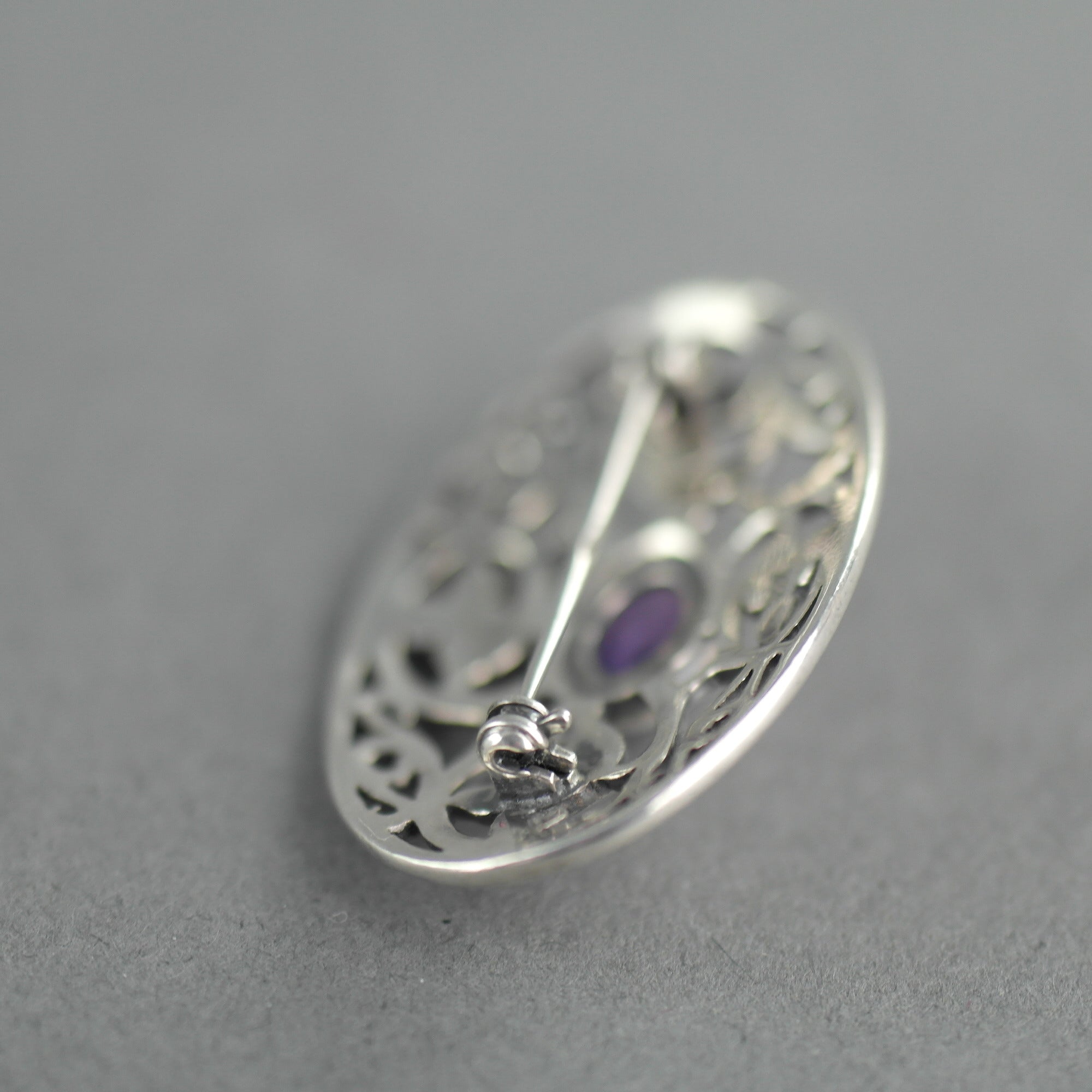 Vintage sterling silver pin brooch with amethyst cabochon