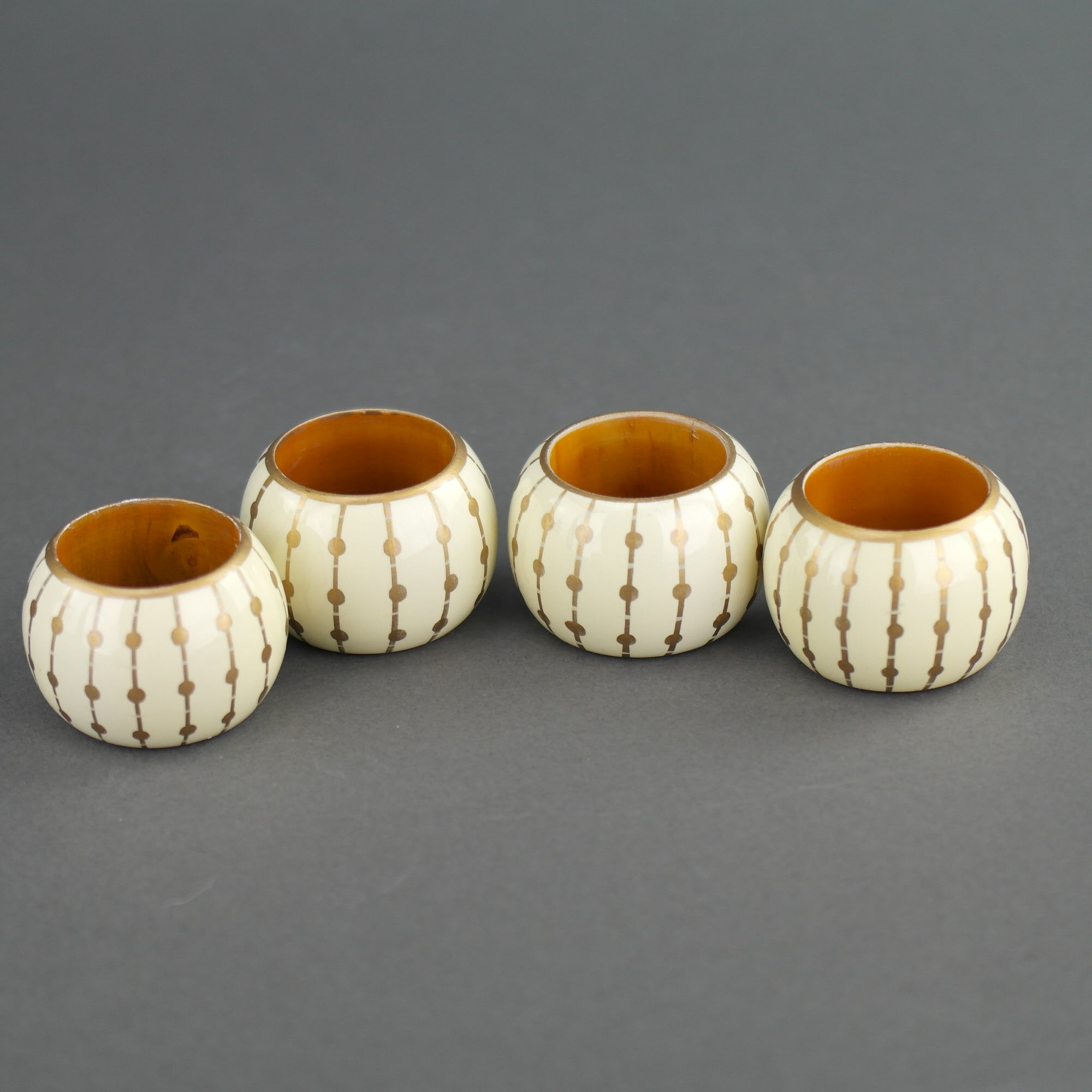 Vintage Wellesley Manor four napkin rings set boxed wood white gold colour