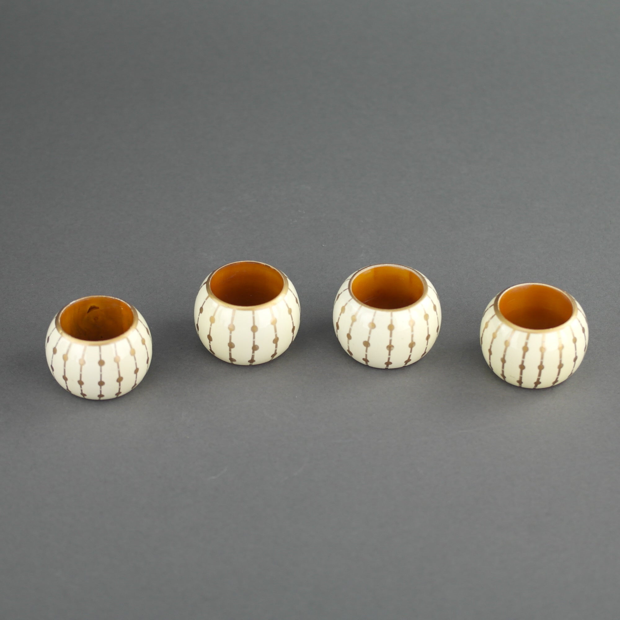 Vintage Wellesley Manor four napkin rings set boxed wood white gold colour