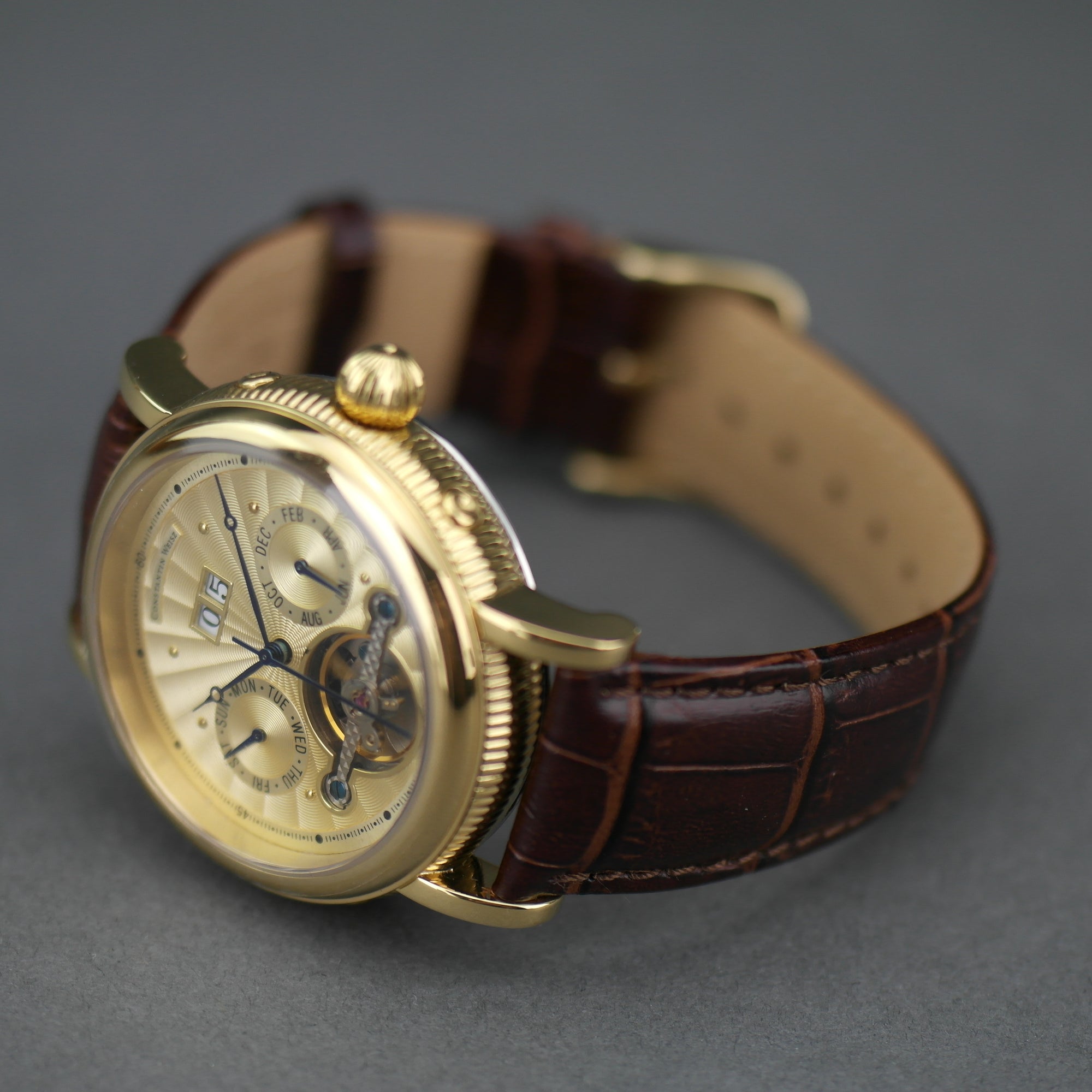 Constantin Weisz Automatik-Armbanduhr mit offenem Herzen, vergoldet, braunes Lederarmband