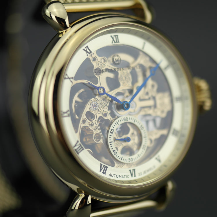 Constantin Weisz Reloj de pulsera automático chapado en oro con esfera esquelética y pulsera milanesa