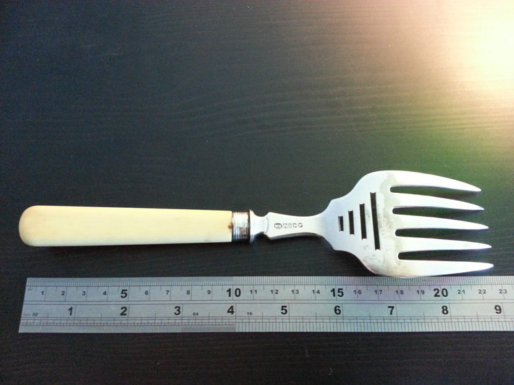 Antique silver plated ornamented serving fork British Empire