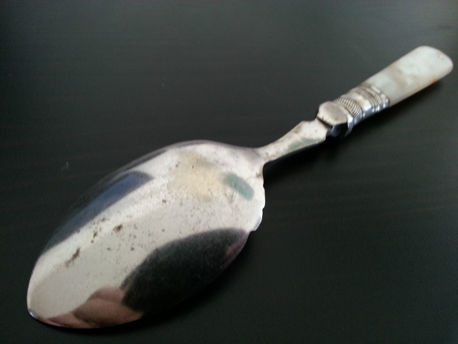 Antique ornamented desert silver plate spoon mother of pearl handle