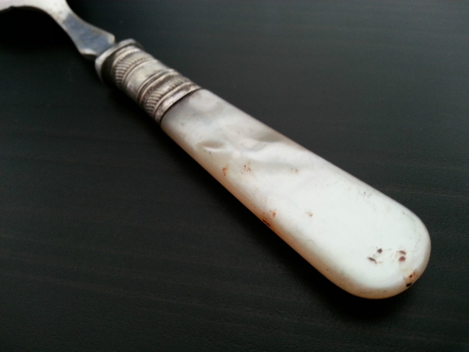 Antique ornamented desert silver plate spoon mother of pearl handle