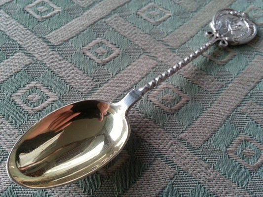Antique 1909 gold plated sterling silver spoon Shakespeare on the top
